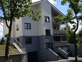Mehrfamilienwohnhaus Limburg; Innenputz Auenputz Maler-Tapezierarbeiten